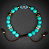 Tibetan Turquoise and OnyxEvil Eye Charm Bracelet