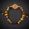 Tiger Eye Wheel Of Dharma Charm Bracelet